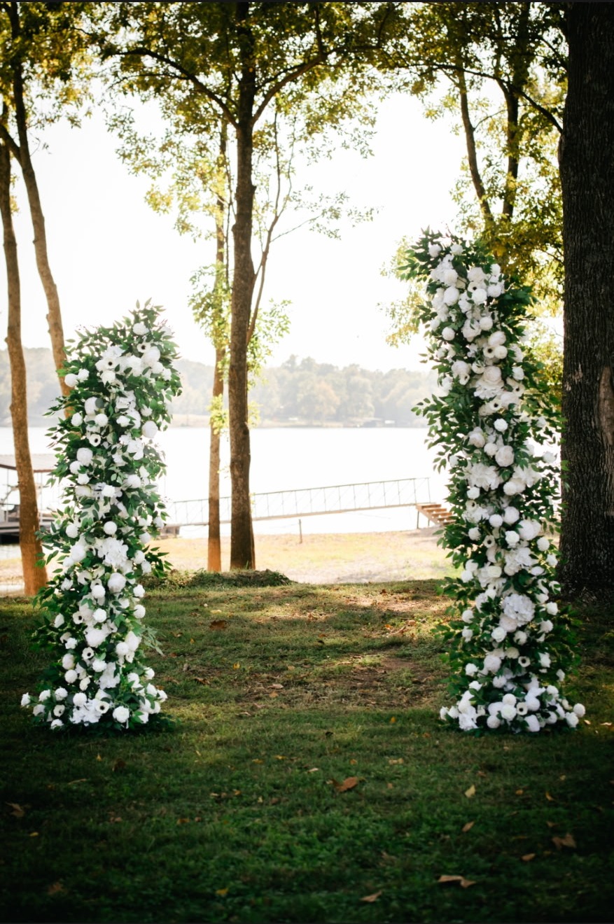 Floral ceremony arch overlooking Grand Lake