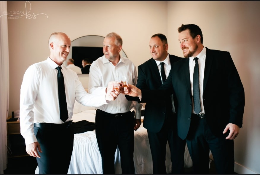 Groomsmen toasting before the ceremony